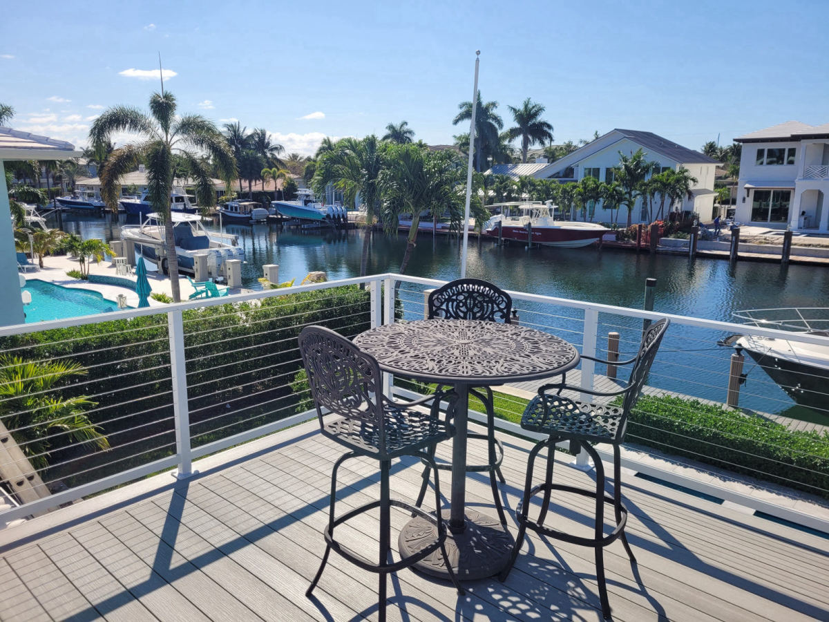 Luxury outdoor deck and pool area built by Deckmasters