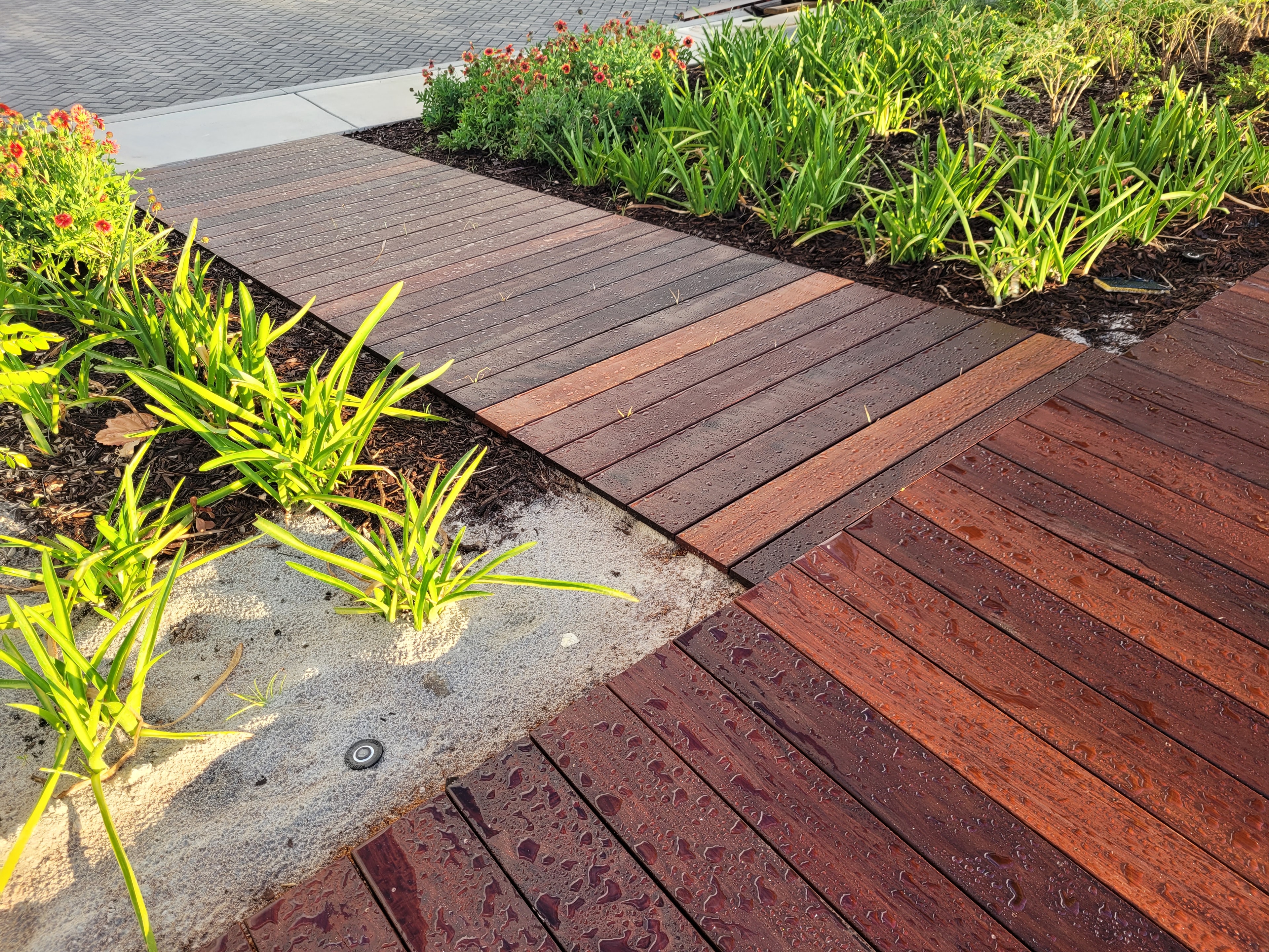 Ritz-Carlton Residences Pompano Beach — Waterfront deck with garden plantings