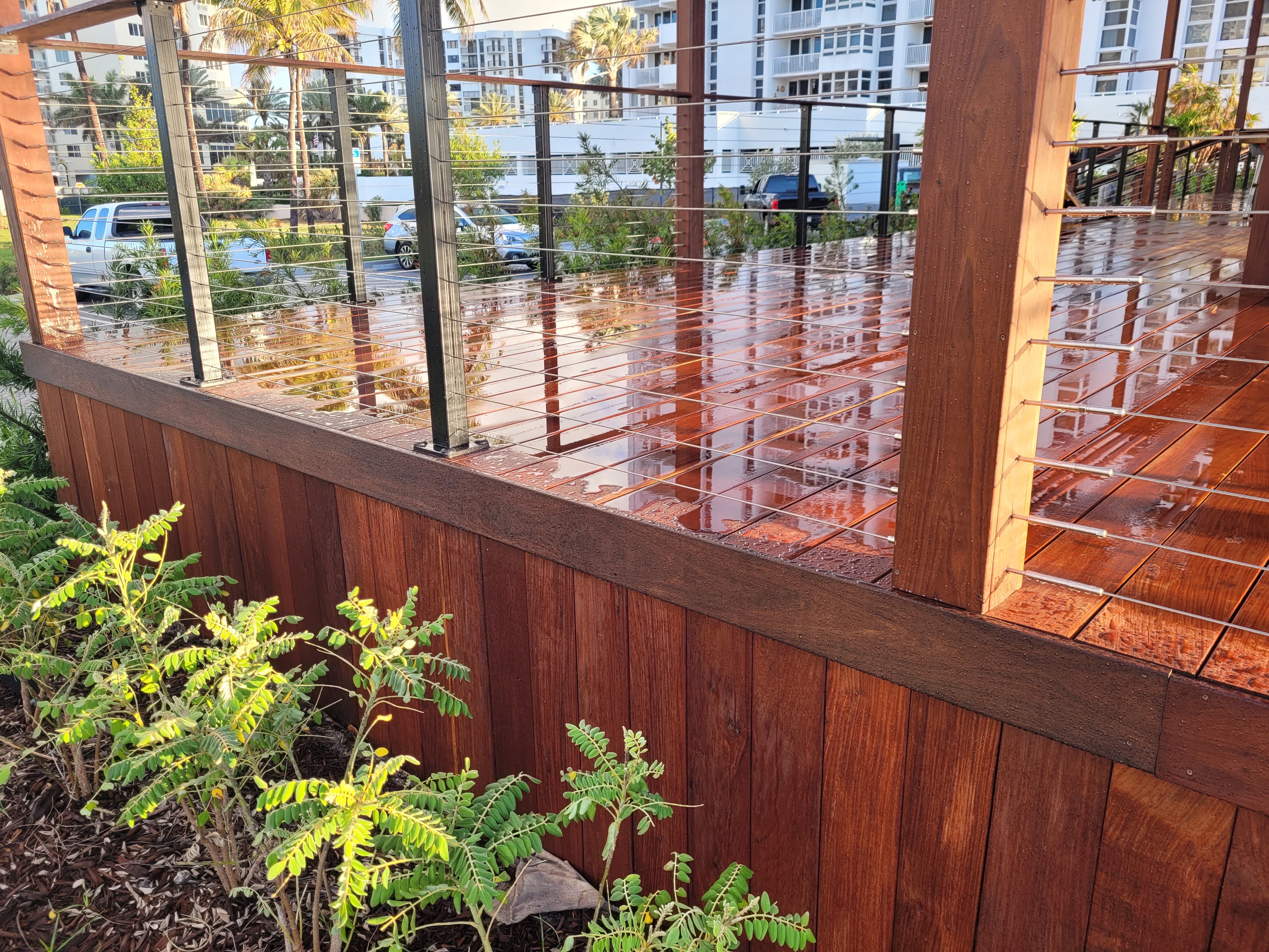 Ritz-Carlton Residences Pompano Beach — Ipe deck with urban apartment view