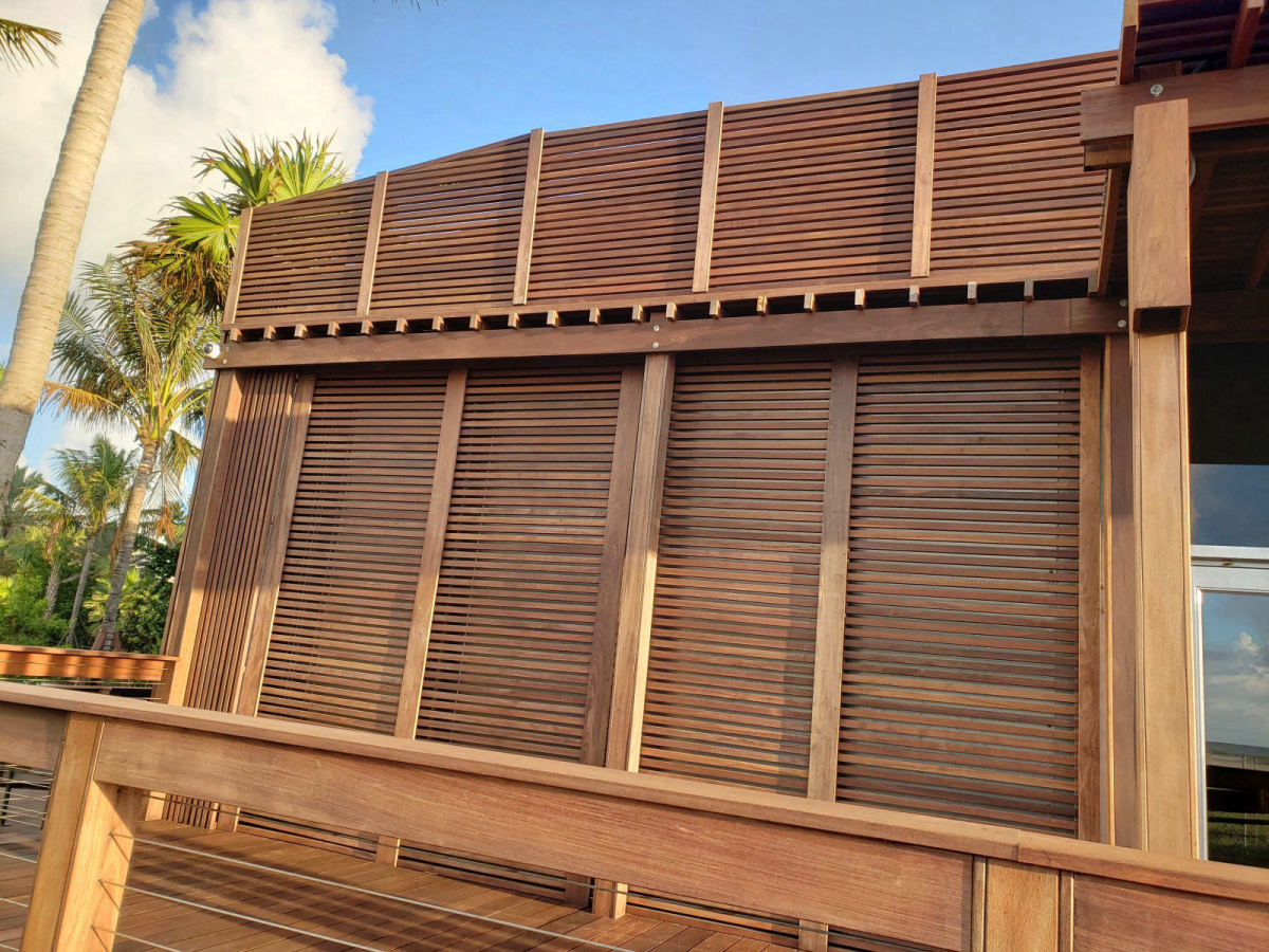 Solemar Pompano Beach — modern wooden house with louvered Ipe shutters