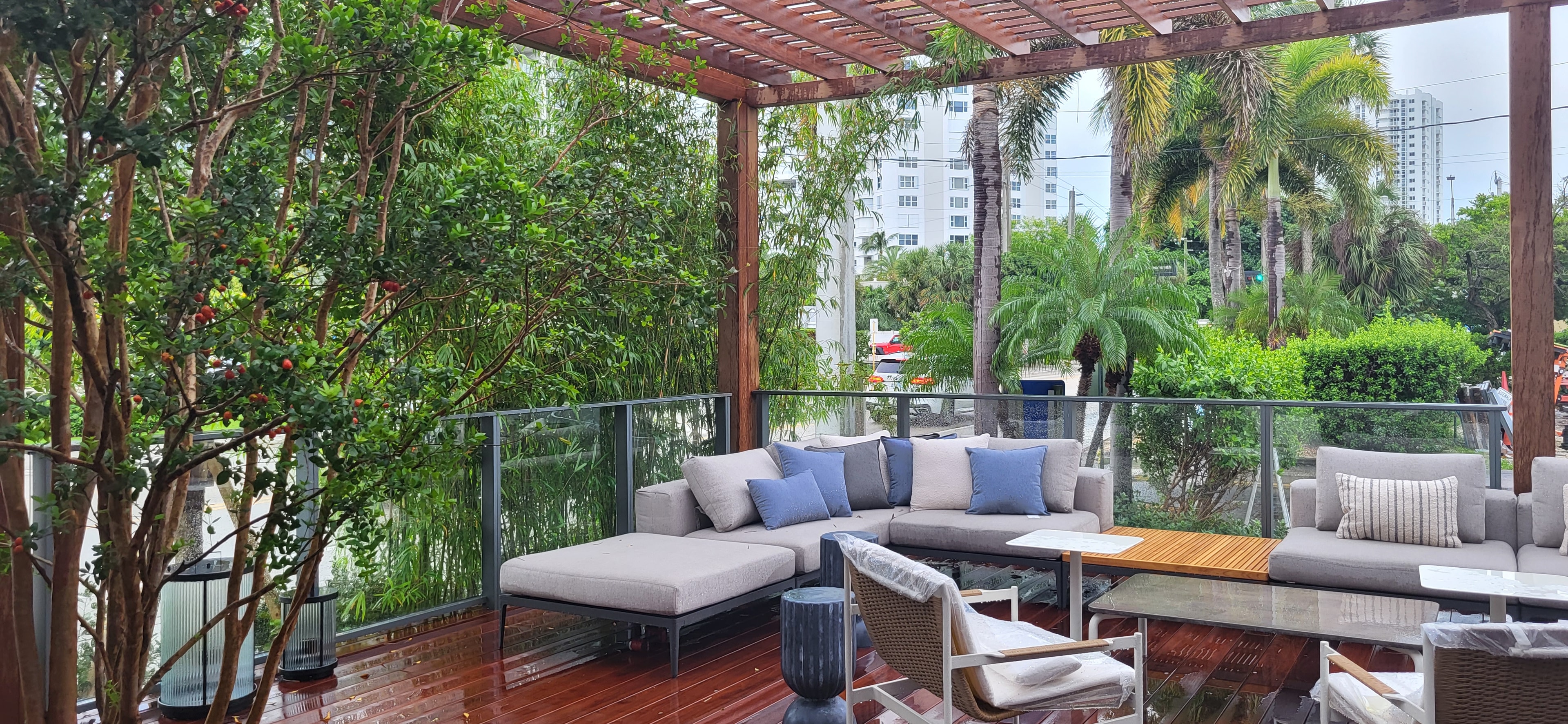 Waldorf Astoria Pompano Beach — rooftop patio with lounge seating and tropical plants