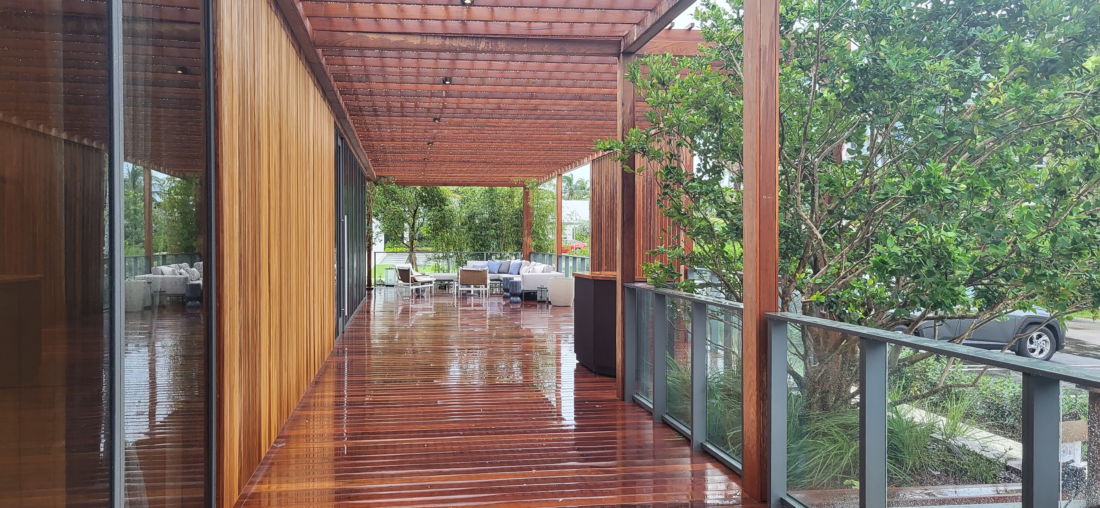 Waldorf Astoria Pompano Beach — wooden deck with pergola seating area
