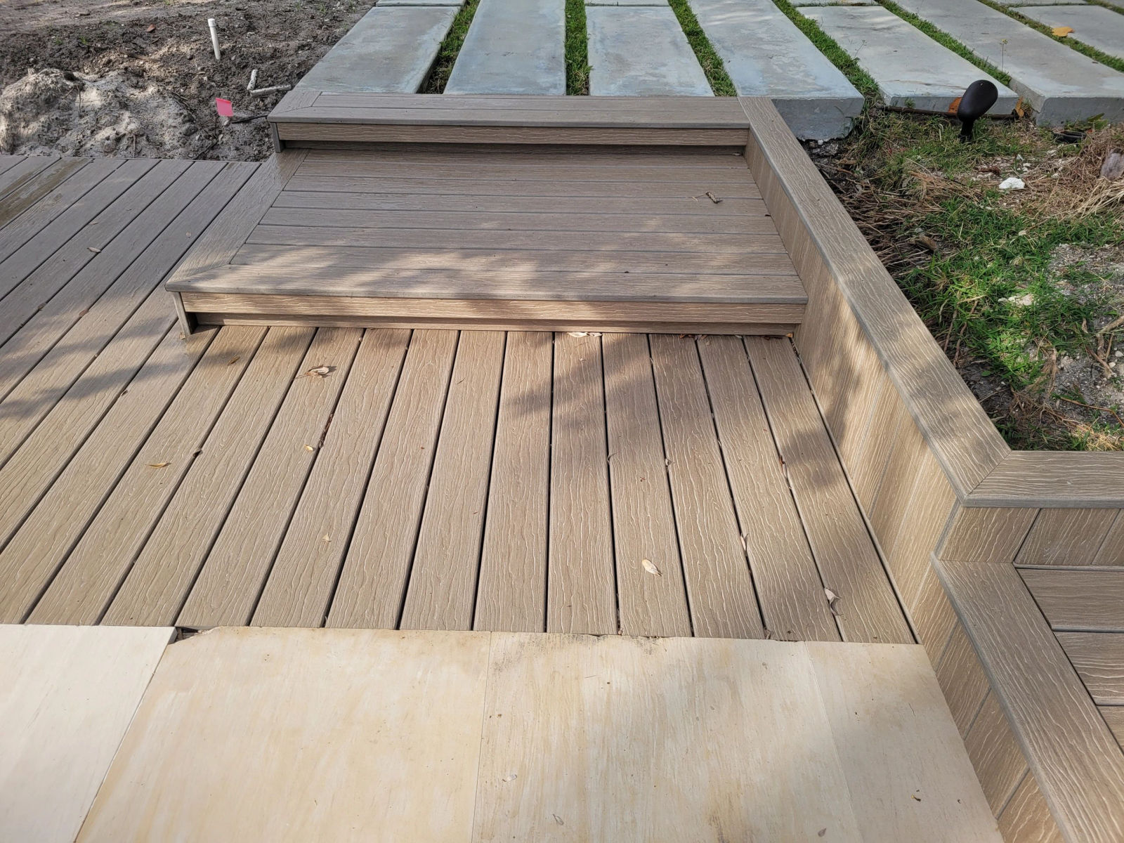 Adriana Lima Residence — finished composite deck overlooking waterway