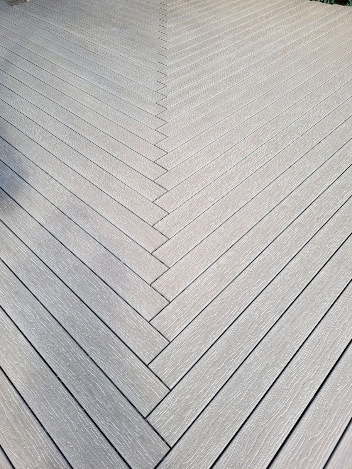 Adriana Lima Residence — vertical view of waterfront deck and dock