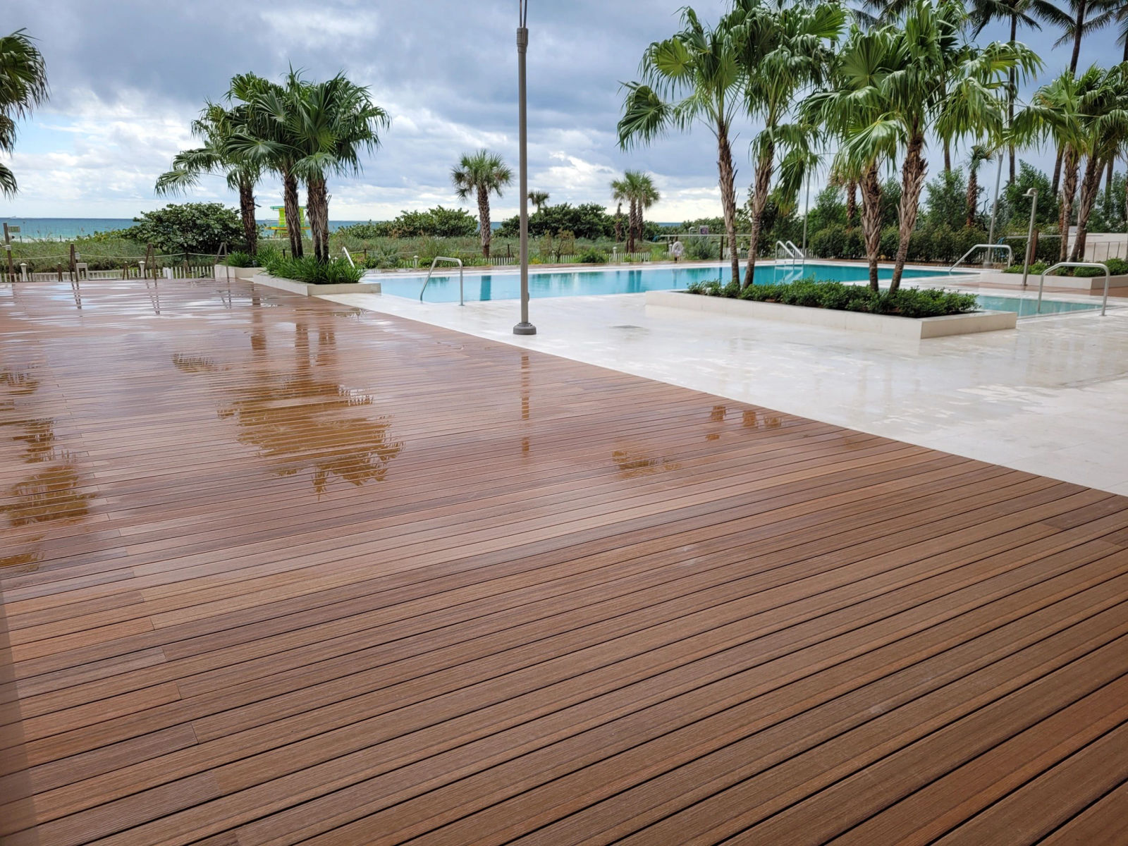 Composite deck at 57 Ocean Miami Beach — finished deck surface and ocean view