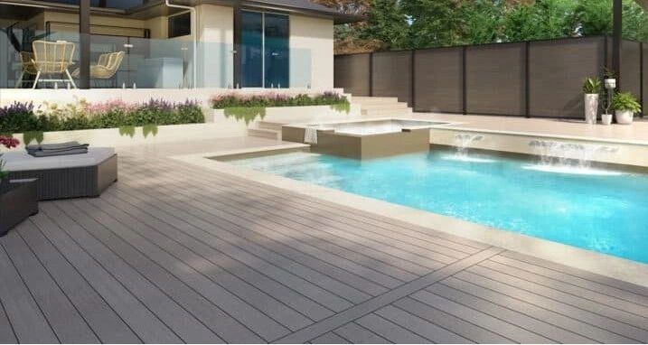 Clubhouse decking installation — finished pool deck surface